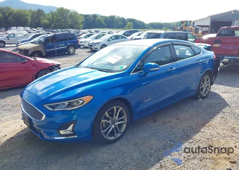 2019 Ford Fusion Hybrid Titanium z USA, uszkodzony, nr VIN 3FA6P0RUXKR120747